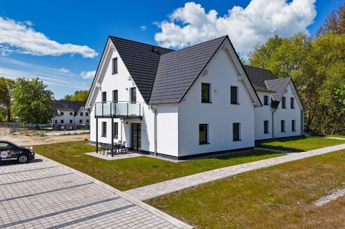Lobbe Apartamento | Rex Rugia FeWo15-3 mit Schwimmbad und Saunanutzung im AHOI-Erlebnisbad Sellin