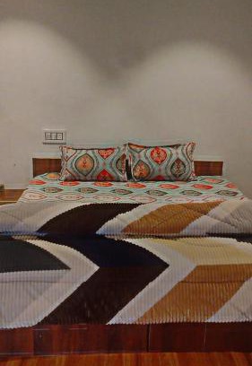 Shamshi Casa | River side cafe guest cottage