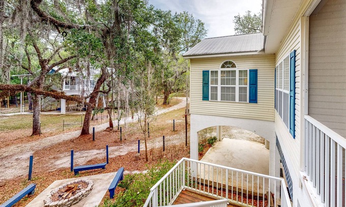 Bell Casa | Riverfront home with screened porch, shared dock