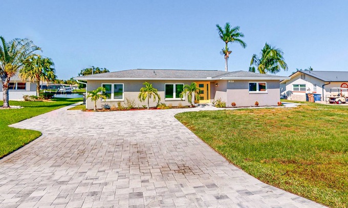 Fort Myers Shores Casa | Riverfront home with beautiful views, private pool, screened lanai, grill, & W/D