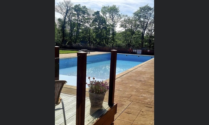 Bont Newydd Cabina | Riverside Cabin with Large Decking Area set in 120 acre Country Park, Snowdonia