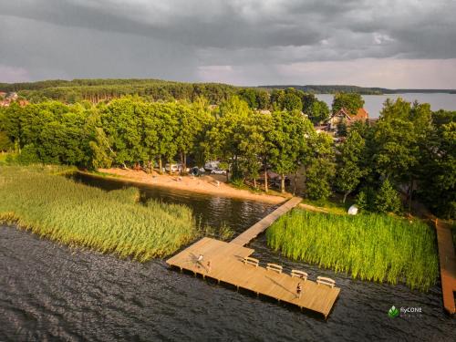 Chojnice Complejo | RiW Małe Swory - Domek pływający Houseboat i domki drewniane