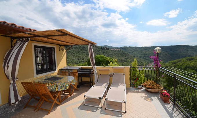 Costiolo Apartamento | Romantic apartment with large terrace in panoramic position in the green