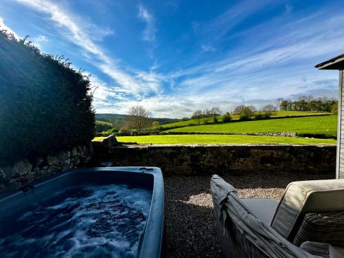 Alport Casa | Romantic four poster Cottage private outdoor Hot Tub & Sauna at Harthill Hall plus private daily use of indoor pool and sauna 1 hour per day