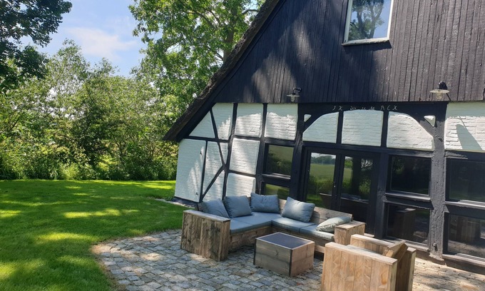 Dorum Casa | Romantic thatched-roof house with wellness area near the dyke
