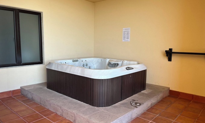 Paraíso Escondido Complejo | Room with a view of the Pacific and a private Jacuzzi at Sunset Beach Resort