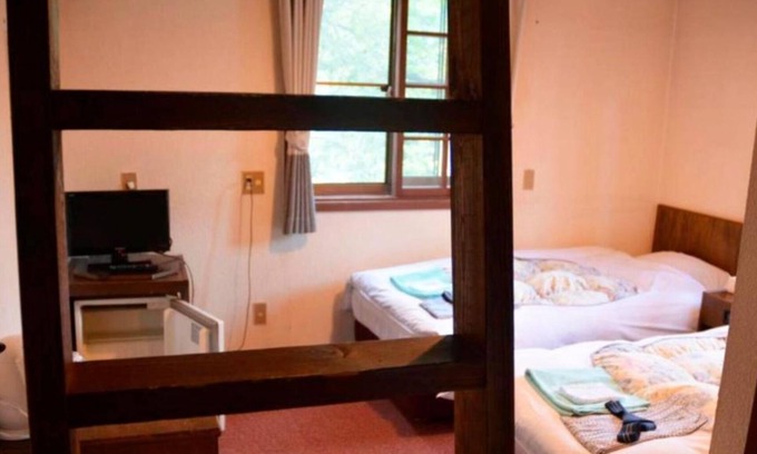 Iida Hotel | Room with loft maisonette type for 3 people / Kitaazumi-gun Nagano