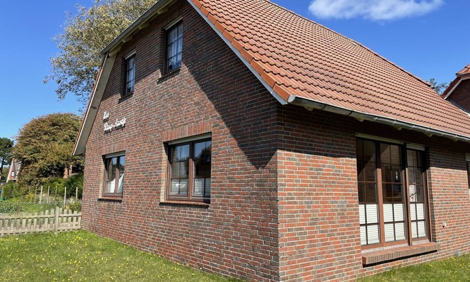Borkum Apartamento | Ruhepol am Meer: Gemütliche Ferienwohnung in Grüner Umgebung