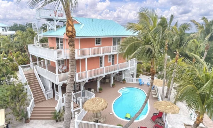 Captiva Casa | Rum Cove: Private Heated Pool, Golf Cart, Docks, Airstrip & Sleeps 10