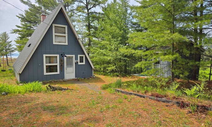 Williamsburg Casa | Rustic A-Frame Retreat on Grand Traverse Bay w/ beach, wifi, fire pit & grill