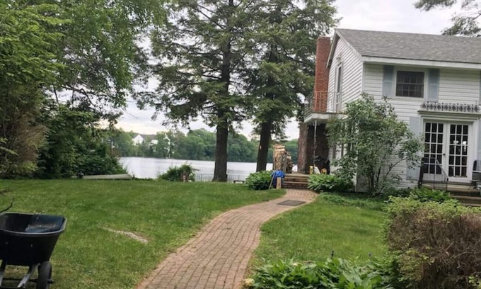 Northwood Casa | Rustic Lake front cottage nestled in the pines with a Golf Putting Green.