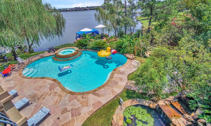 Panther Creek Casa | Sail to Hughes Landing, Waterway, or Pavilion. Heated Pool, Jacuzzi, & Cinema