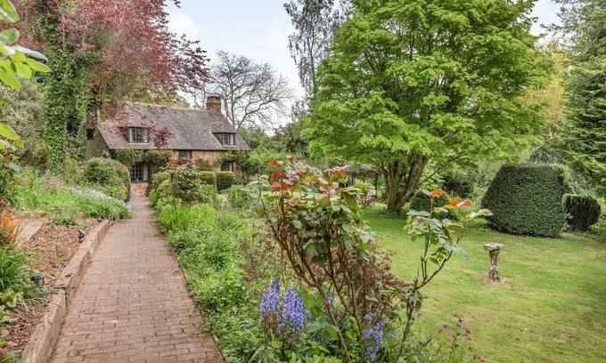 Old Cleeve Cabaña | SAINT PANCRAS CHAPEL, pet friendly, with open fire in Williton