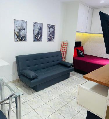 Ponta da Praia Apartamento | Sala living em prédio Familiar na Av da Praia
