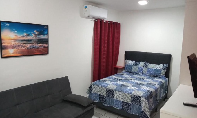 Ponta da Praia Apartamento | Sala living na Av da Praia.