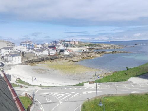 San Cibrao Apartamento | San Ciprian Atico Tres Playas by I Love Norte