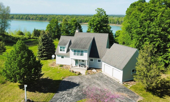 Lake Township Casa | Sandhill House - Large and Spectacular Lakefront Home with Water Toys!