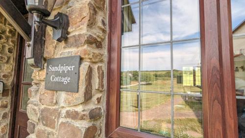 North Buckland Casa | Sandpiper Cottage: cosy home near the beach