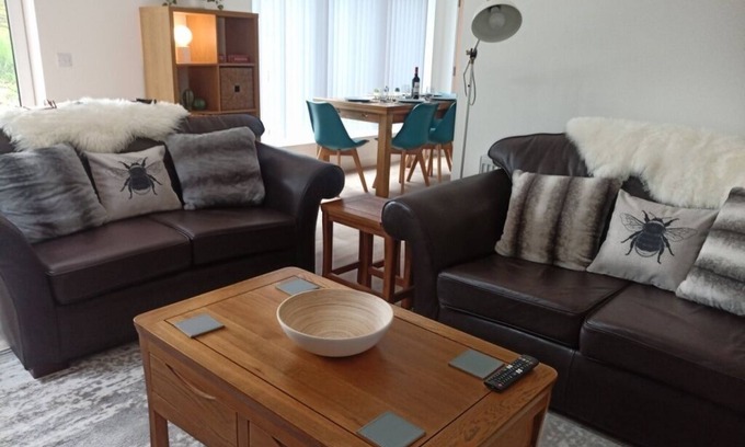 Grantown-on-Spey Cabaña | Sawmill Cottage, set in Woodland Beside the River Spey
