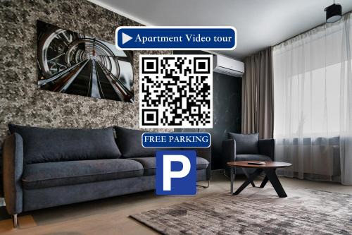 Andrejsala Apartamento | Scan QR code for apartment video tour - free parking, gym access, air conditioning, kitchen and more in central Riga