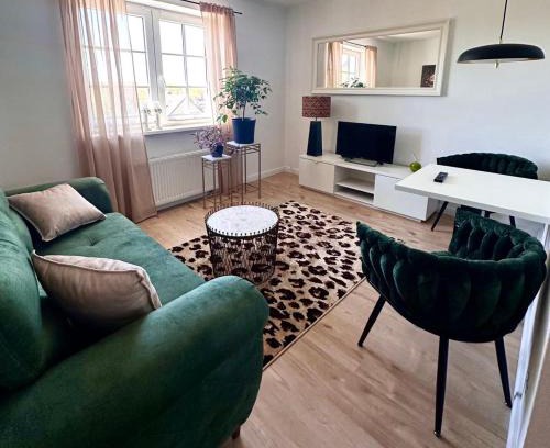 Rablinghausen Apartamento | Schön gelegene und gemütliche Ferienwohnung am Weserufer