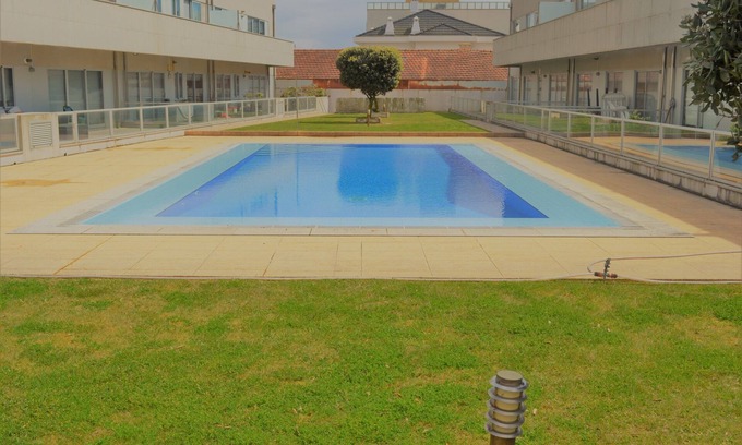 Lavra Apartamento | APARTAMENTO FRENTE AL MAR, DOS DORMITORIOS Y BAÑOS, PISCINA Y PLAYA DE SANDY