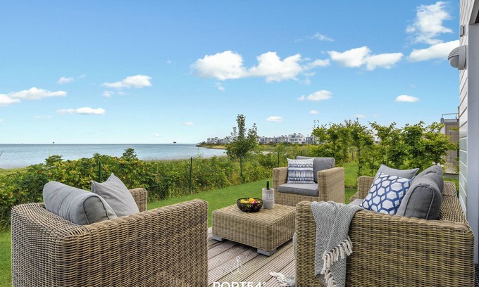 Olpenitz Apartamento | Sea view - 1st row on the water, terrace, ground floor, sauna, bathtub, electric grill