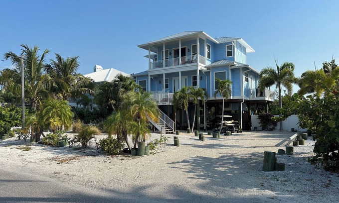 Palm Island Casa | SEACLUSION - Island Paradise Home Close to the Beach with Pool and Boat Dock