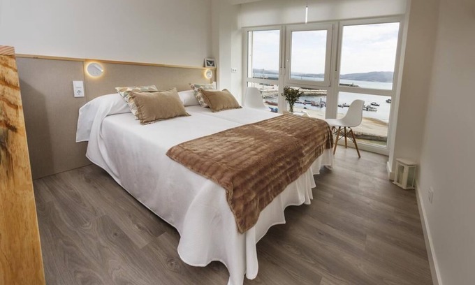 Muxia Apartamento | Estudios Vista Mar ventana galería Muxia / Seaview studios gallery window Muxia