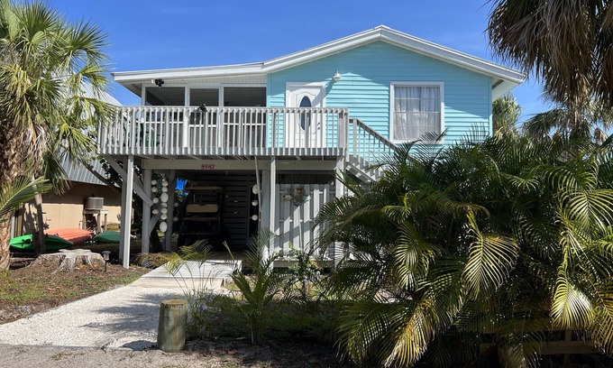 Placida Cabaña | Secluded Beach House, steps to Sandy Beach on LGI with a shared dock!🏖️🎣