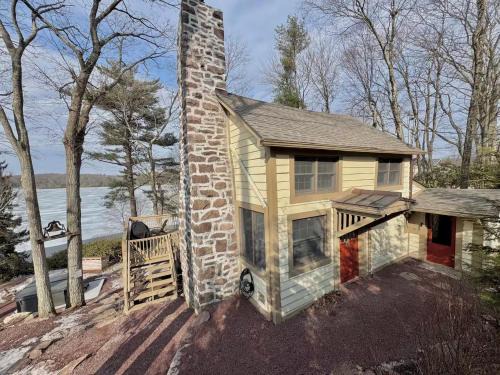 Lake Harmony Casa | Secluded Lakefront Cabin with Hot Tub and Views
