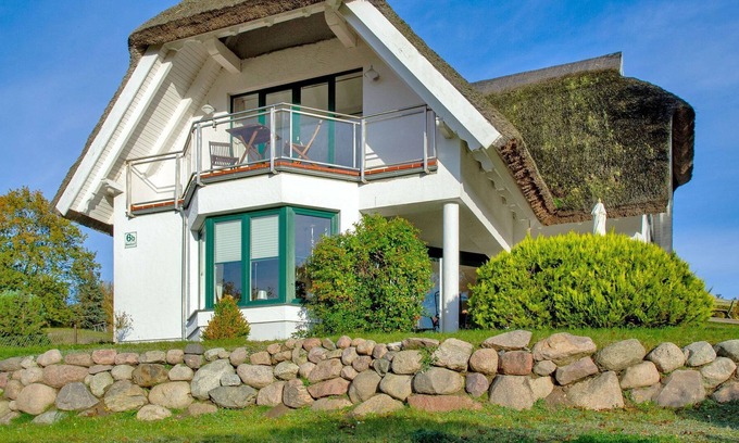 Seedorf Apartamento | Seedörper Reethus F558 Casa con tejado de paja con vista al agua - Seethörper Reethus