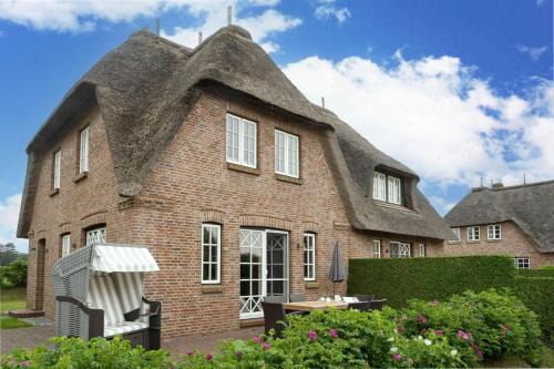 Utersum Casa | Seesucht-Föhr - Moderne Reet-Haushälfte mit Sauna, Garten & Terrasse nahe Wattenmeer