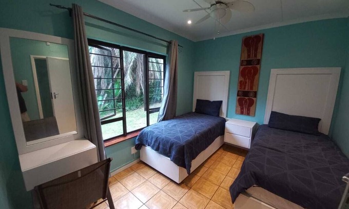 Scottburgh South Condominio | Self catering accommodation with a garden view. 100mt from the beach