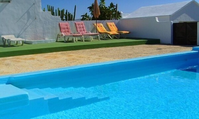 Tahiche Cabaña | Apartamento con jardín privado, piscina climatizada comunitaria, TV Satélite