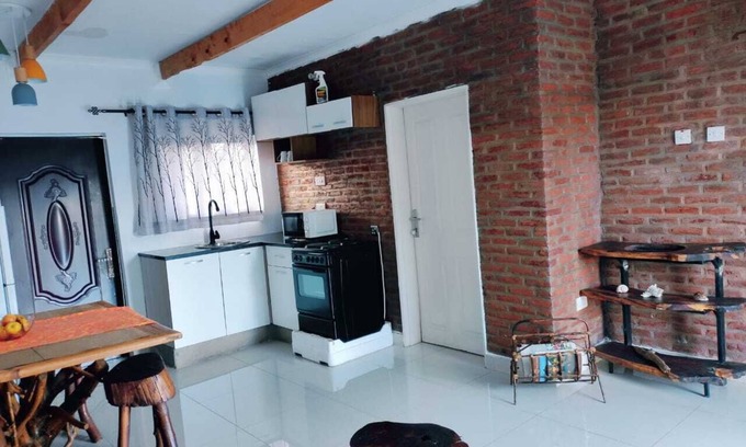 Chitedze Otro | Self-contained bed sitter overlooking a beautiful scenery in an animal farm.