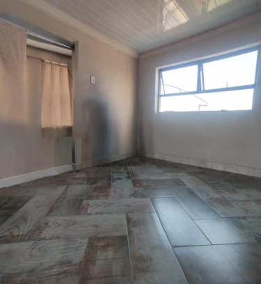 Greater Johannesburg Metropolitan Area Apartamento | Self serviced cute and comfy nestled in the center of lenasia
