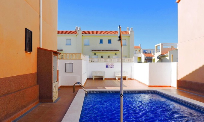 Miami Platja Cabaña | Semi-detached house with community pool in Miami Playa 400 meters from the sea