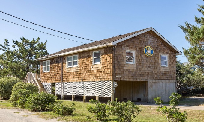 Ocean Isle Estates Casa | Semi-oceanfront dog-friendly home with private hot tub, decks & shared pool