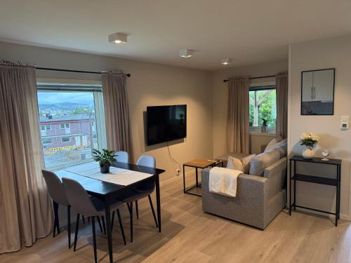 Tromsdalen Apartamento | Sentral og koselig leilighet