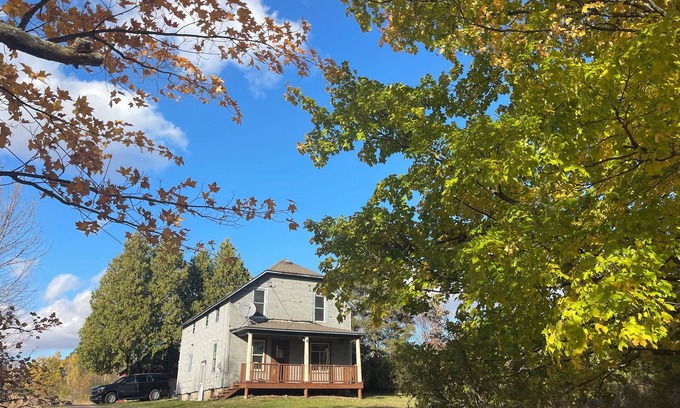 Crystal Falls Otro | Serene 40-Acre Farmhouse Retreat in Crystal Falls, MI