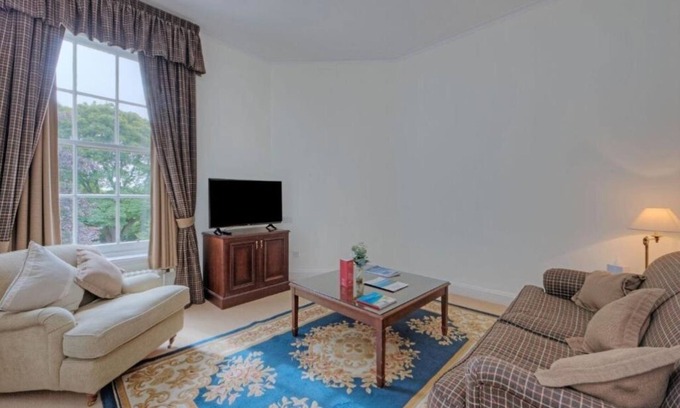 Nairn Hotel | Serene Getaway Steps from the Beach & Historic Landmarks
