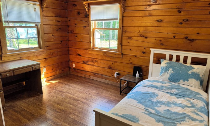 Dunnville Casa | Serene log home on spacious land with trees and a small farm.