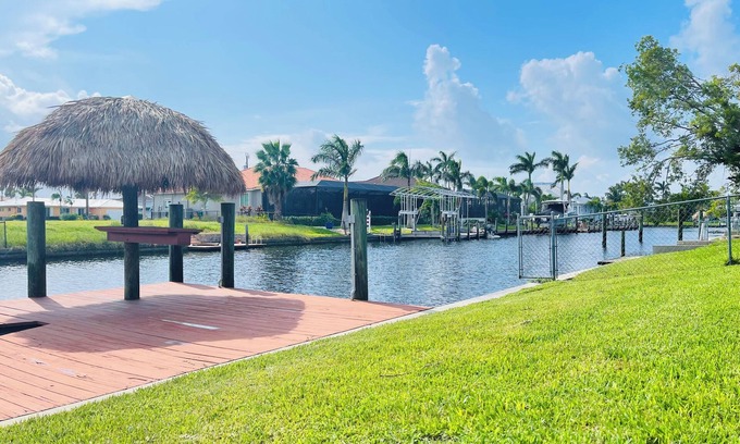 Eight Lakes Casa | Short Distance From Tarpon Point Marina! Gulf Access, Heated Pool, Dock & Tiki!