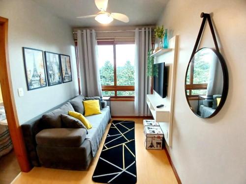 Bairro Lago Negro Apartamento | Siga Gramado - Apto faça tudo a pé! Vista! Tv smart! Ar Cond!