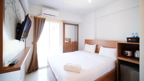 Sidoarjo Apartamento | Simple and Comfortable Studio Apartment at Suncity Residence By Travelio