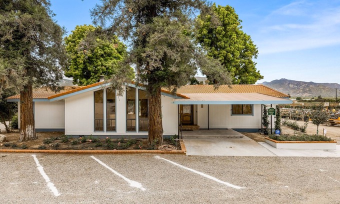 Fillmore Casa | Single-level home surrounded by lush gardens with a washer/dryer, AC, & wet bar