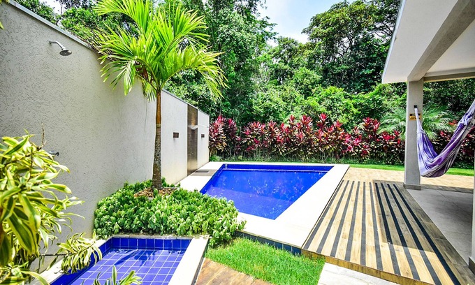 Costa do Sol Casa | Single storey house with 3 suites with air conditioning, WIFI, Smart TV, swimming pool, barbecue.