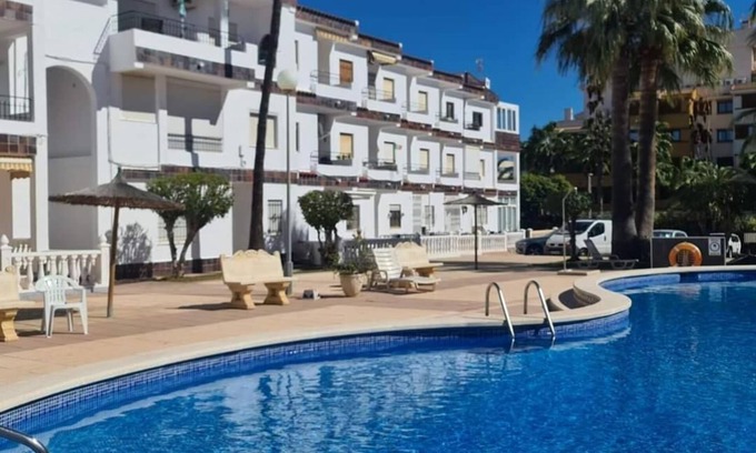 Punta Prima Apartamento | Sit back and relax in a stylish space just a few steps from the beach!