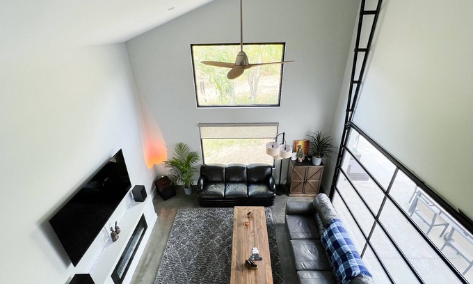 Stevensville Casa | Sleek forest retreat: karaoke, spa, campfire, pool table, grill, outdoor games